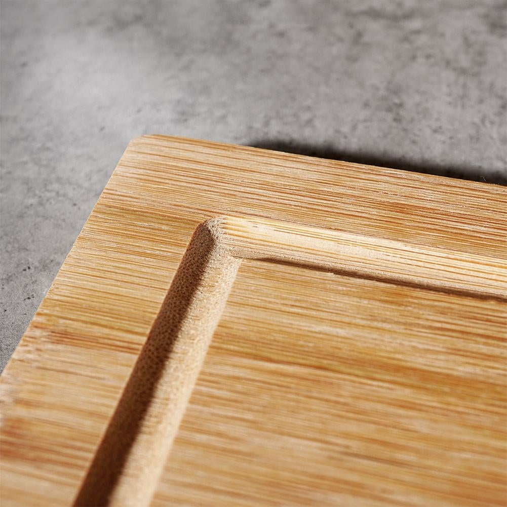 Bamboo cutting board with edge - durable and knife-friendly