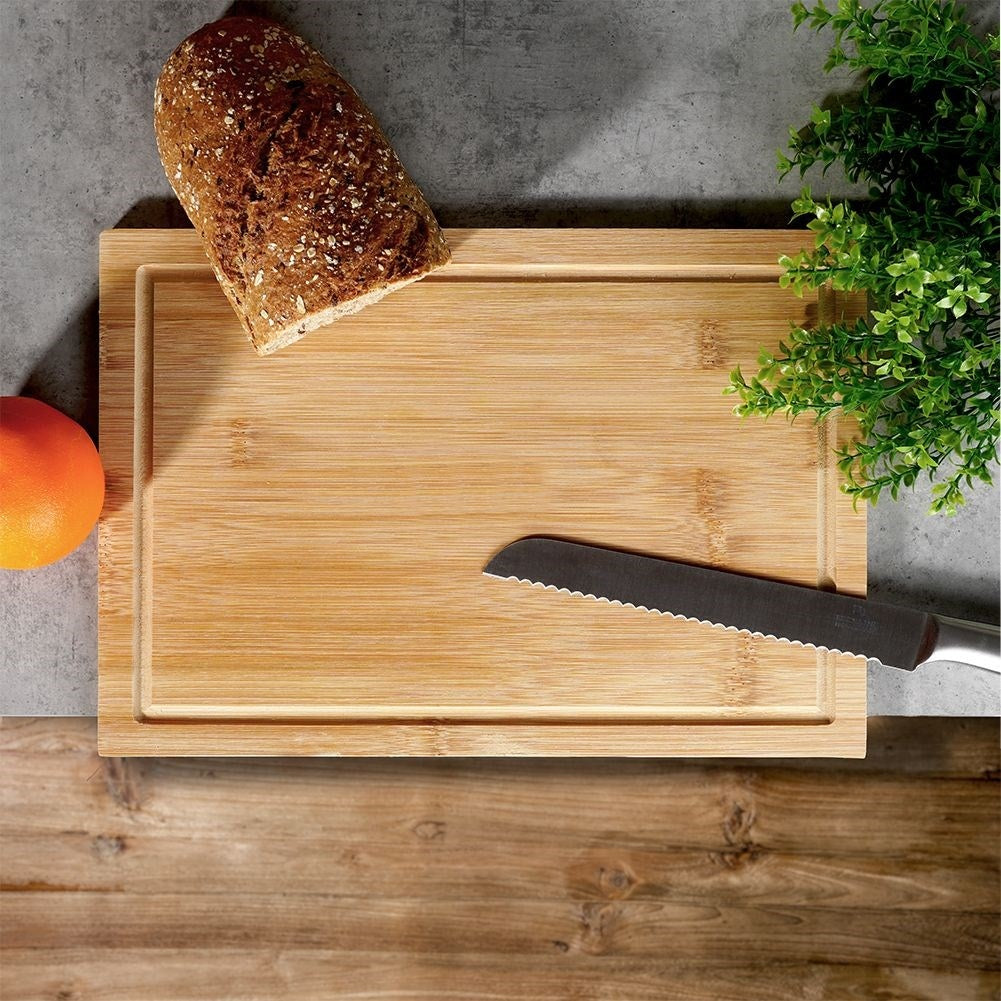 Bamboo cutting board with edge - durable and knife-friendly