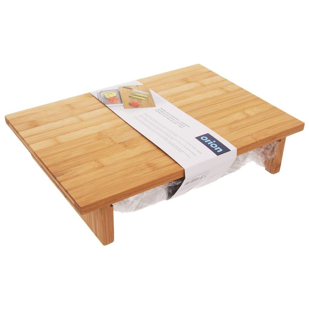 Bamboo cutting board with extendable steel container