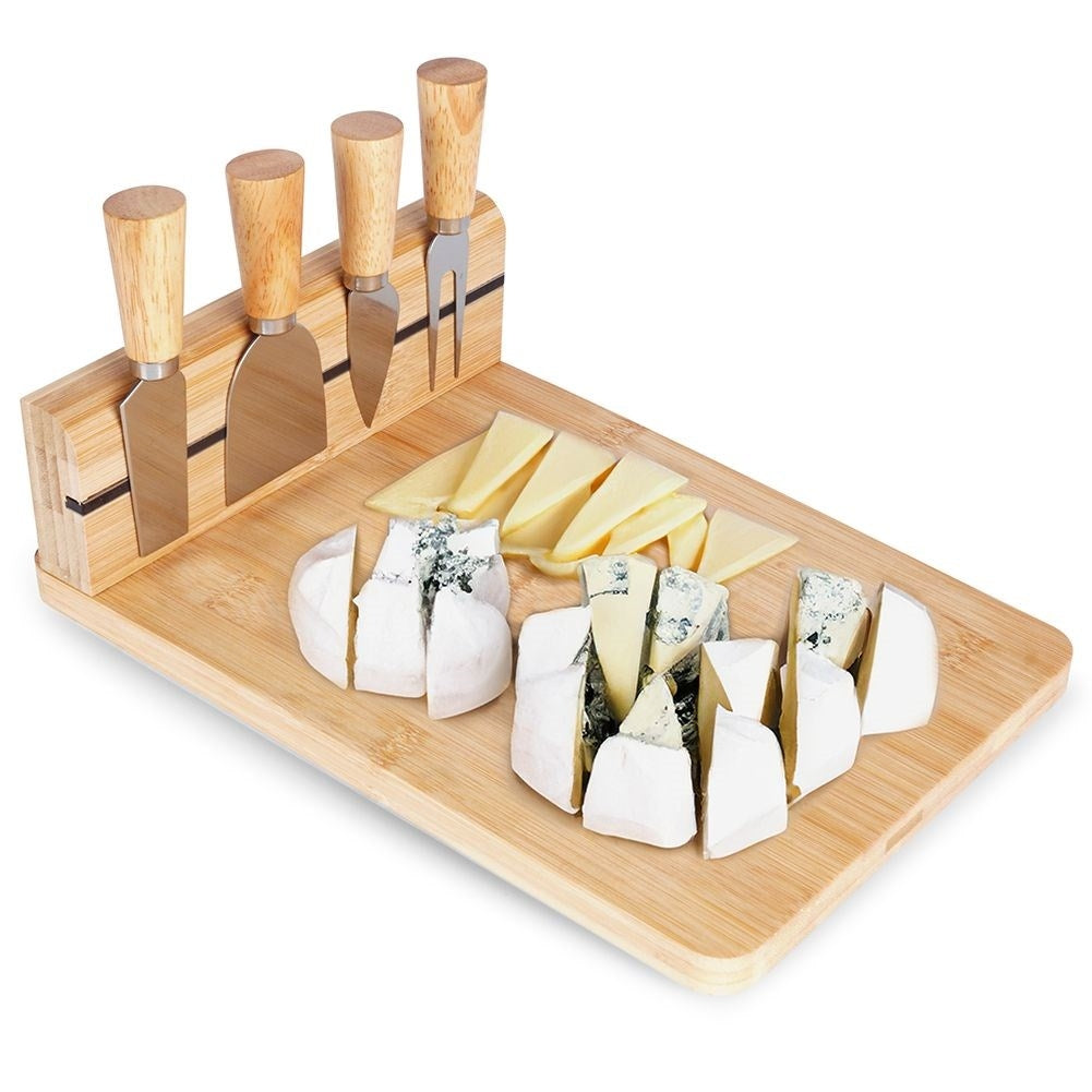 Bamboo cutting board with knife set and magnetic strip for cheeses