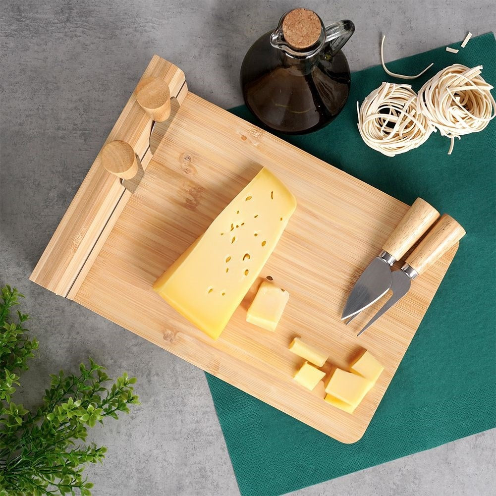 Bamboo cutting board with knife set and magnetic strip for cheeses