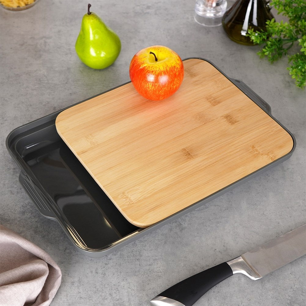 Bamboo cutting board with plastic tray, divided into two parts