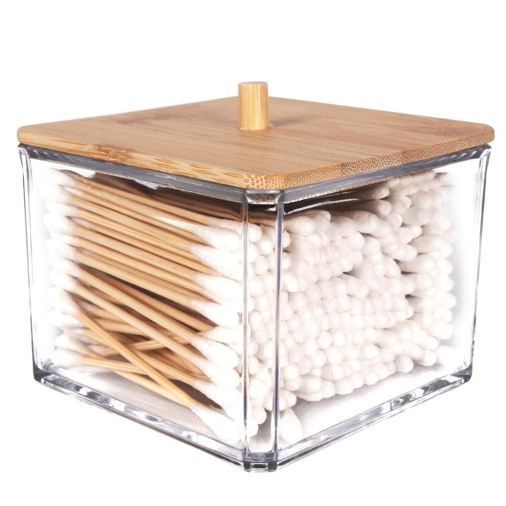 Bamboo wrapped cotton swab container with a stylish design