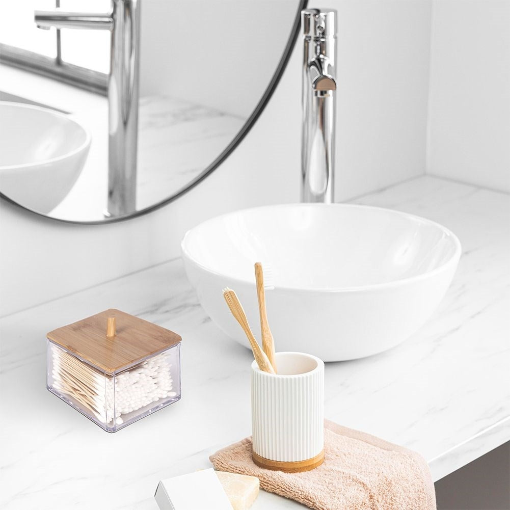 Bamboo wrapped cotton swab container with a stylish design