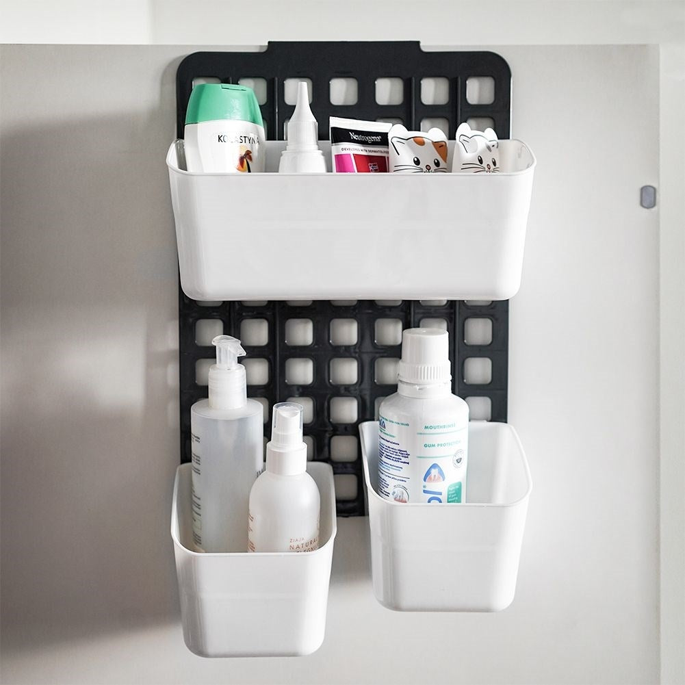 Basket for cabinet doors or shower cubicles with three compartments