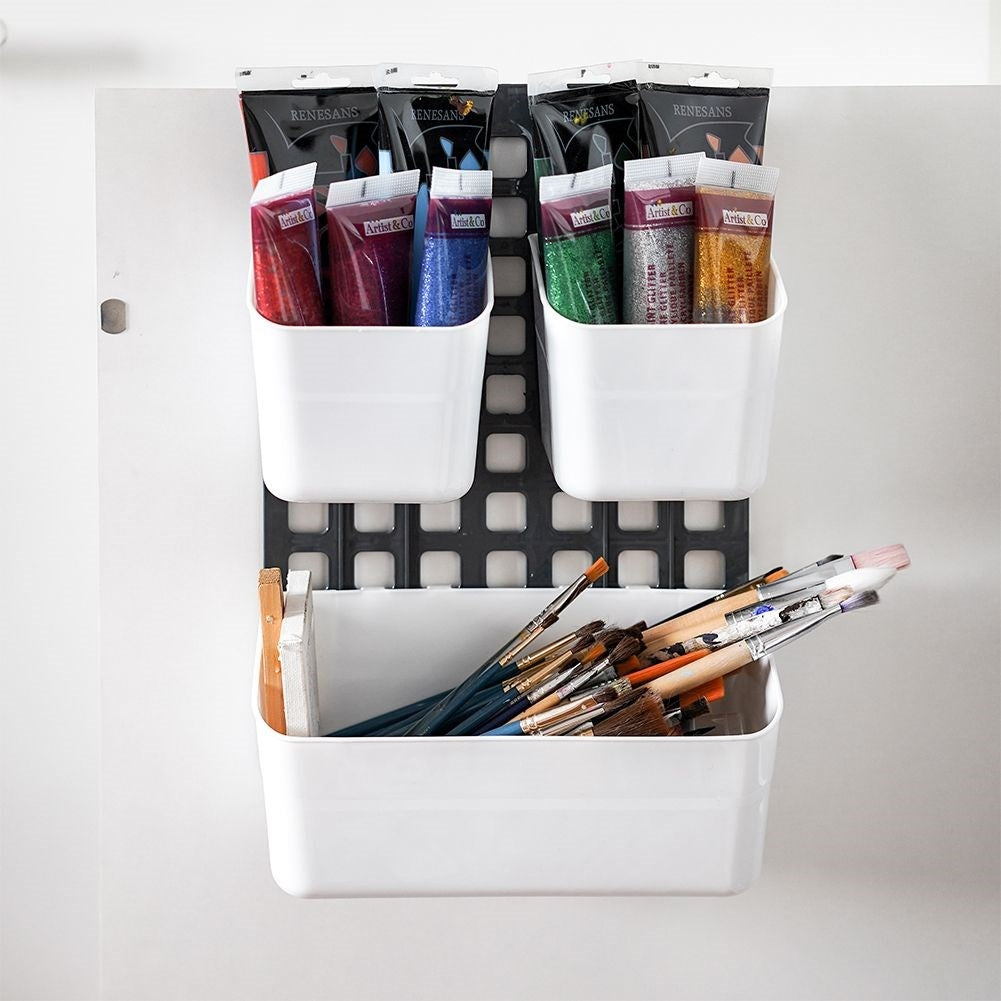 Basket for cabinet doors or shower cubicles with three compartments