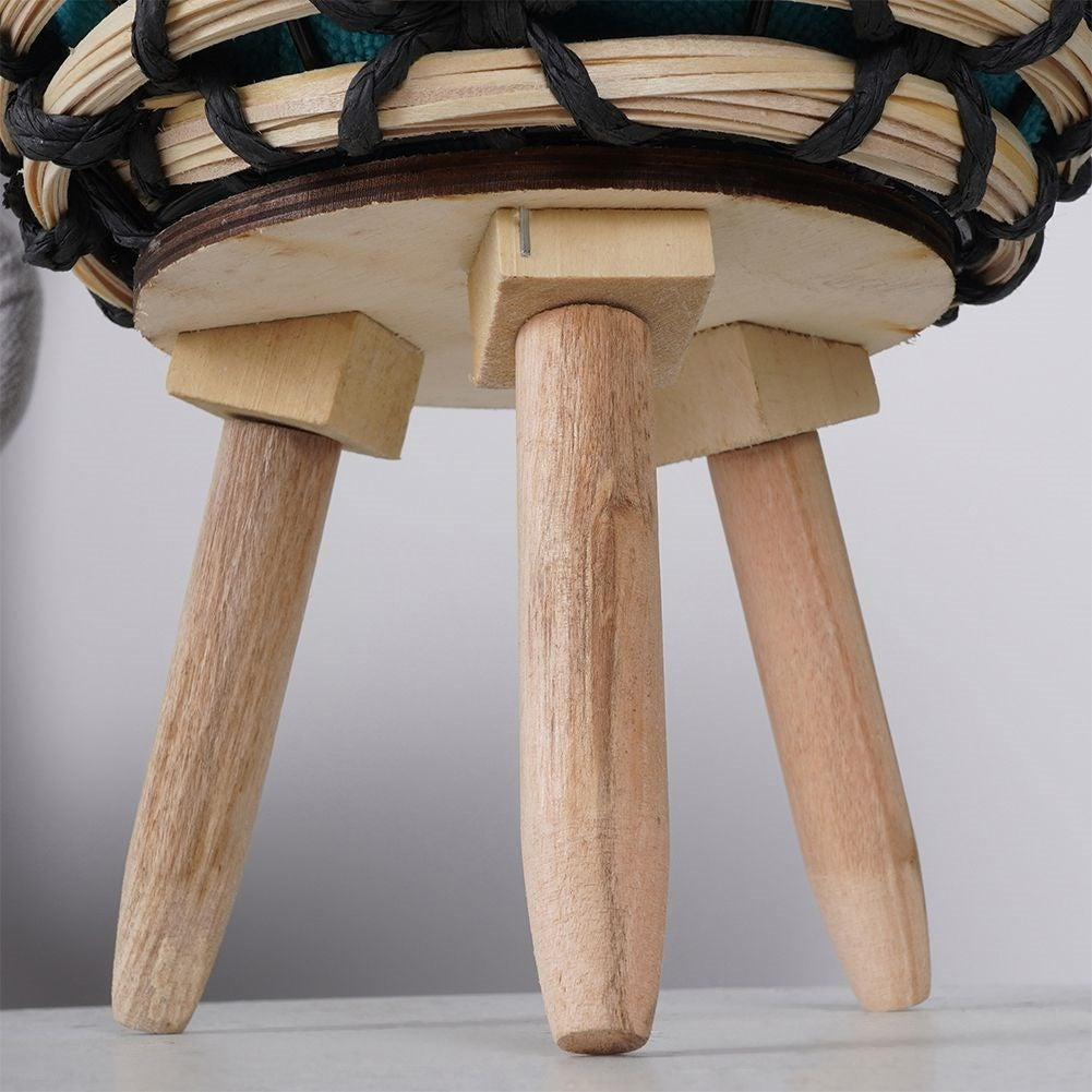 Beautiful flower pot in braided wooden design with sturdy wooden legs