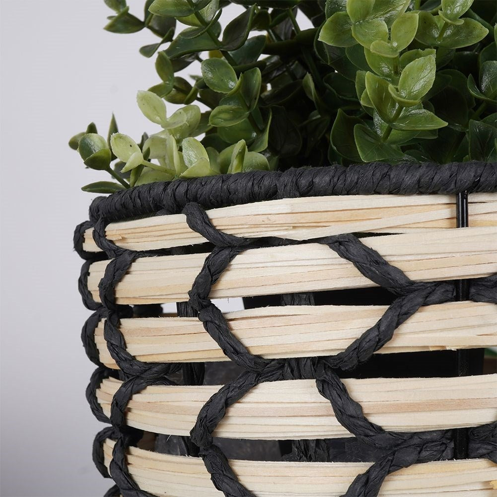 Beautiful flower pot in braided wooden design with sturdy wooden legs