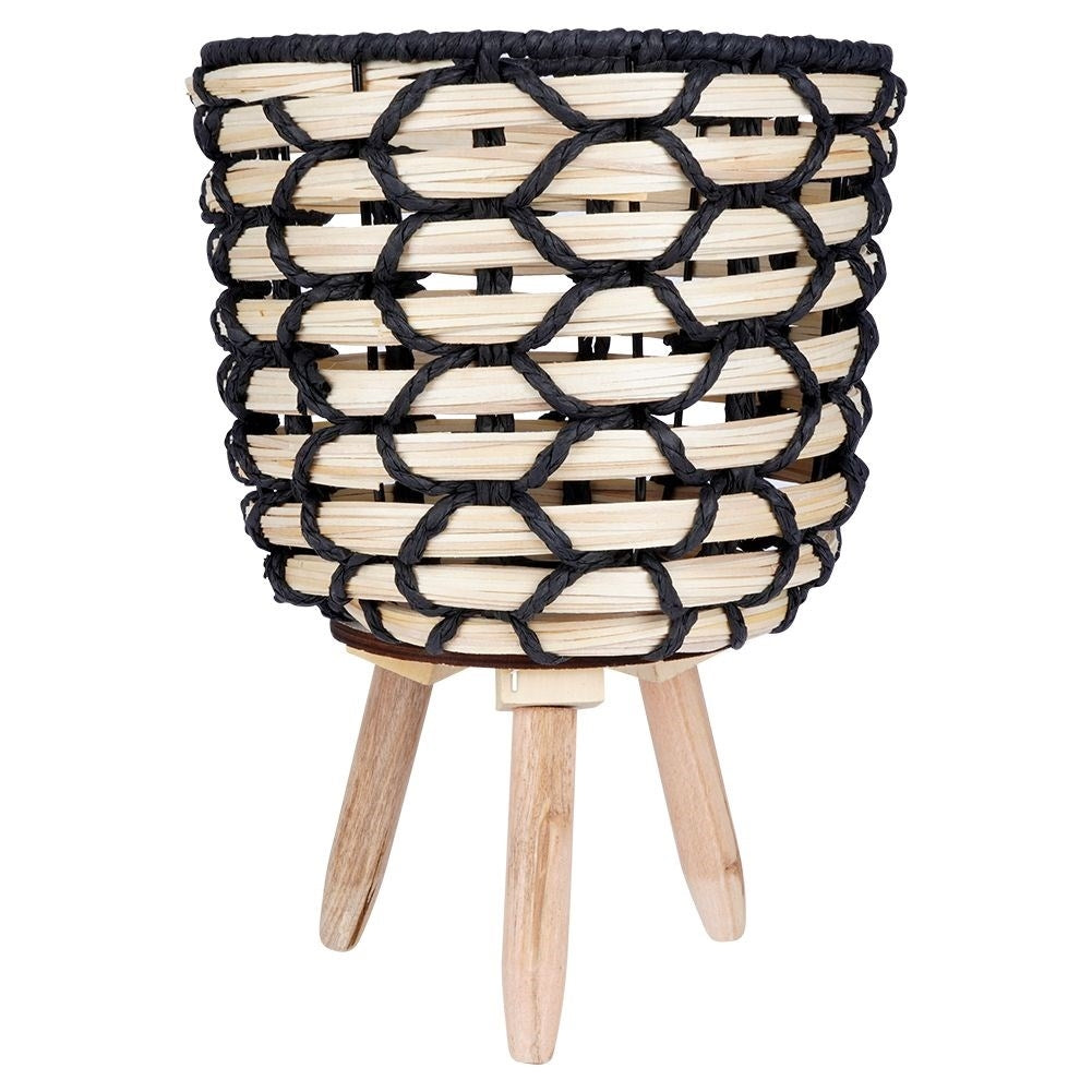 Beautiful flower pot in braided wooden design with sturdy wooden legs