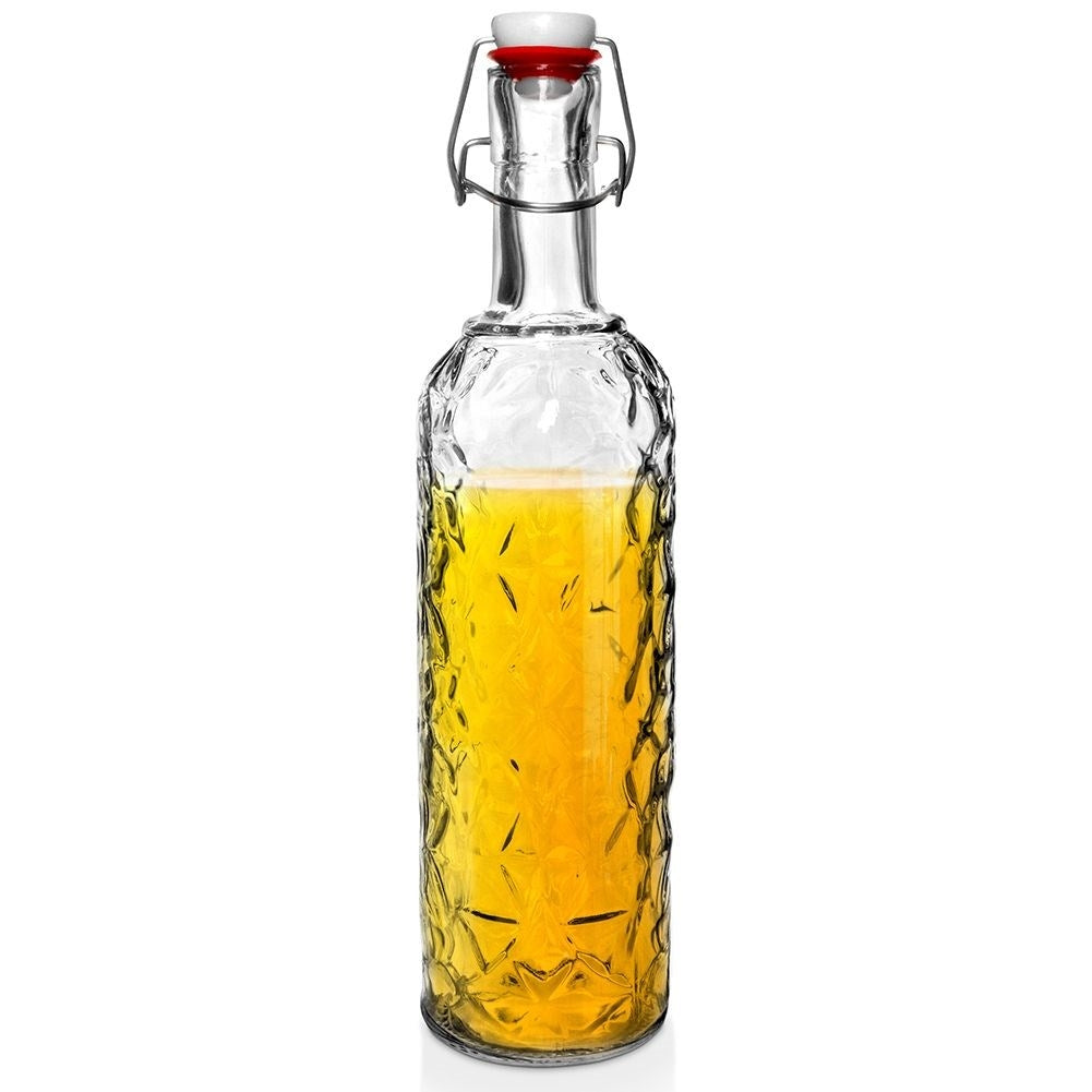Beautiful glass bottle with cork and clamp for drinks