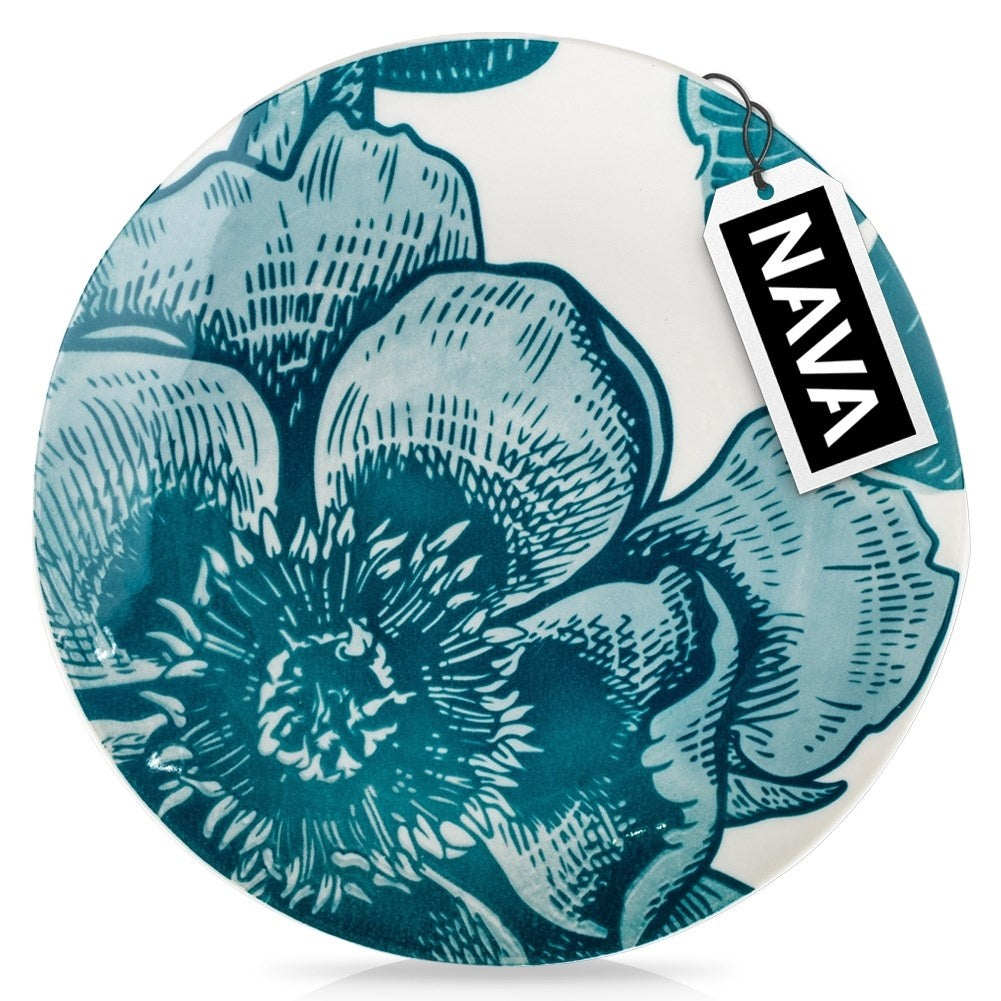 Beautiful white porcelain dish with turquoise floral motifs for desserts