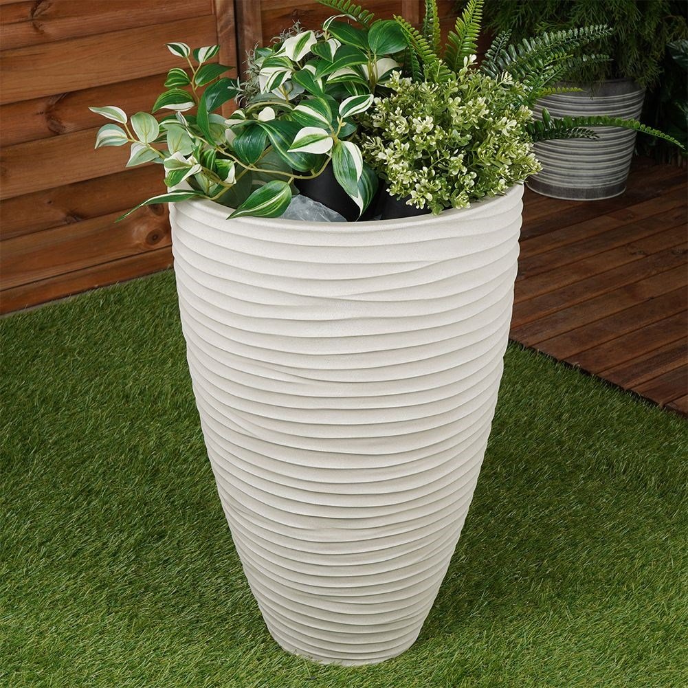 Beige plastic pot with stone imitation - weatherproof and stylish