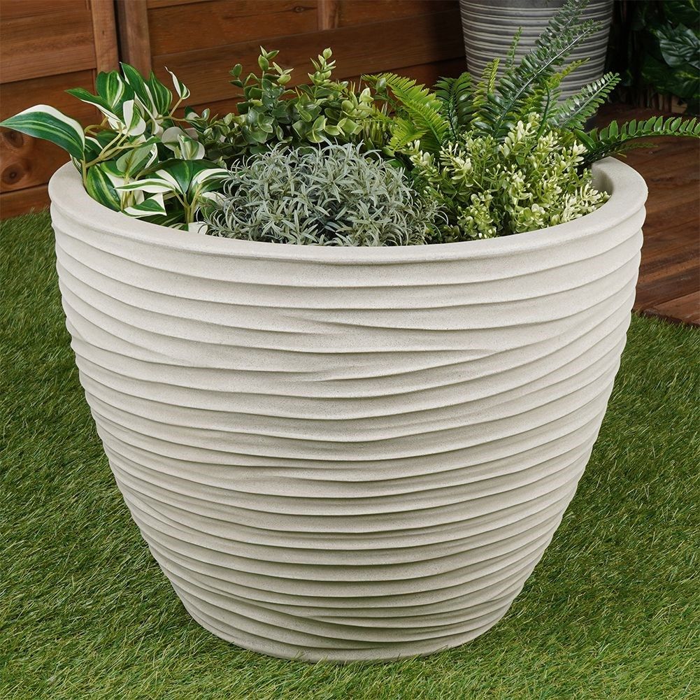 Beige stone imitation flowerpot with decorative pattern