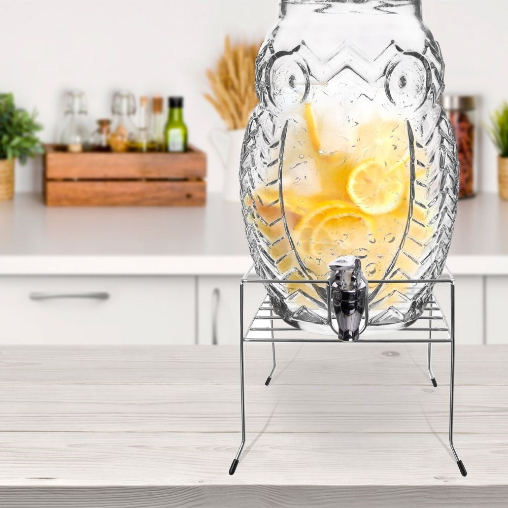 Beverage stand with faucet, fits 3-8L containers. Easy bottling.
