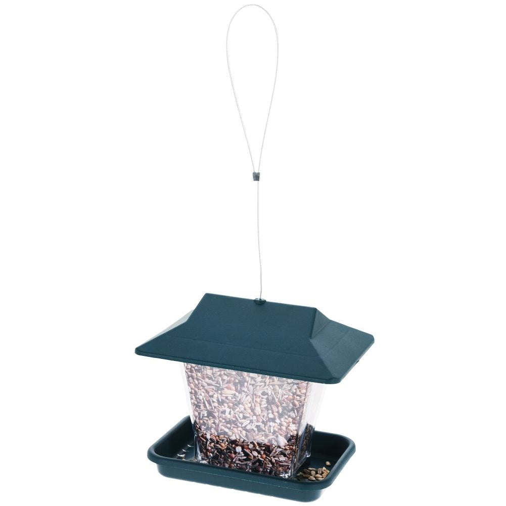 Bird feeder for seeds with 4 seats and suspension