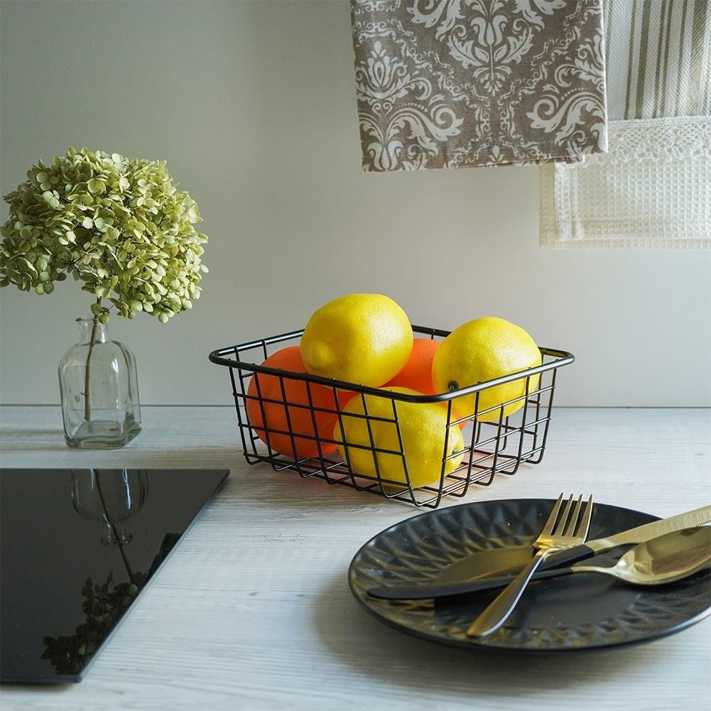 Black LOFT fruit basket in durable metal for versatile storage