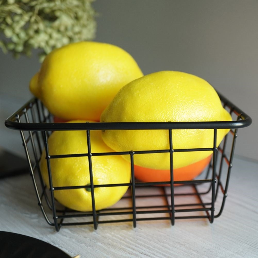 Black LOFT fruit basket in durable metal for versatile storage