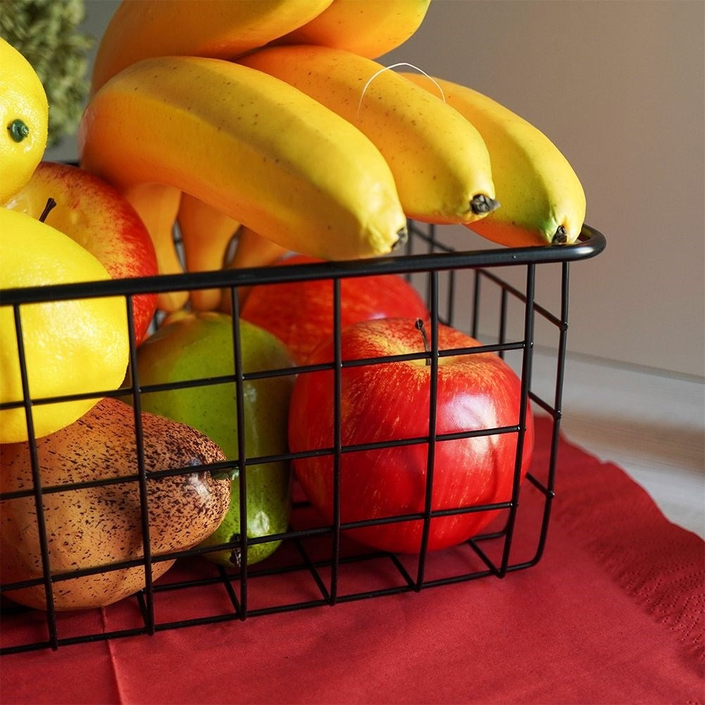 Black LOFT fruit basket in durable metal for versatile storage