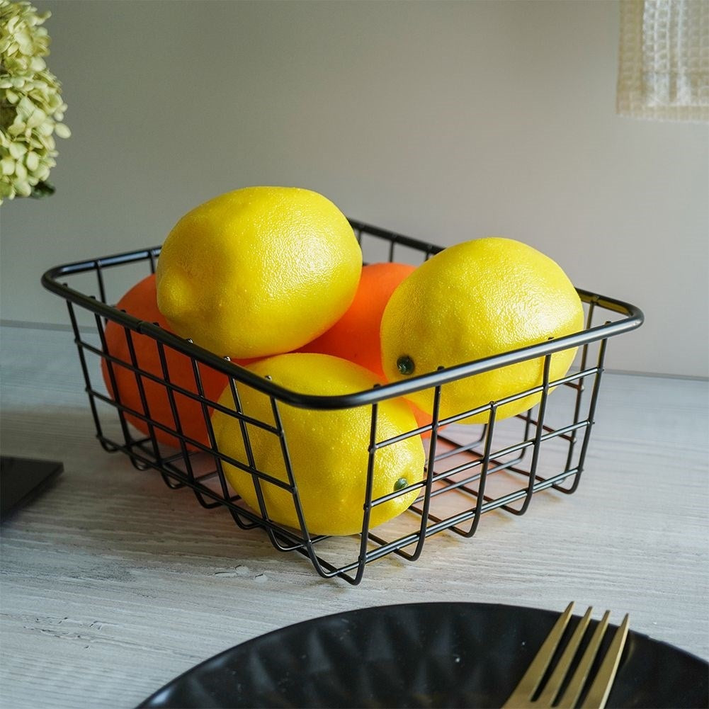 Black LOFT fruit basket in durable metal for versatile storage