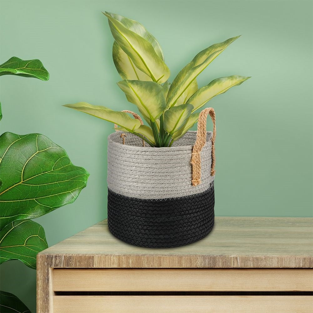 Black and gray waste bin with handle for storage
