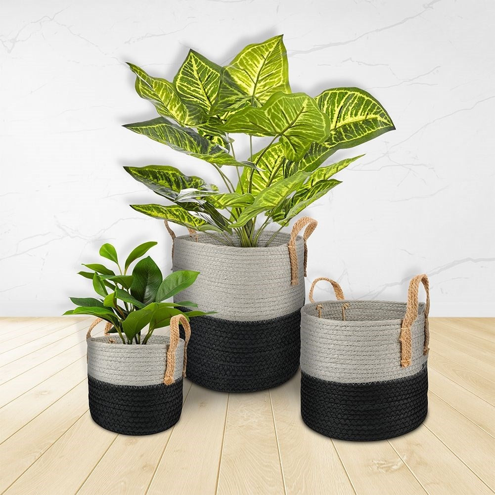 Black and gray waste bin with handle for storage