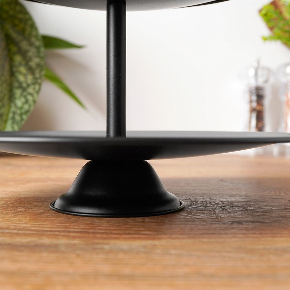 Black cake plate with three levels for muffins and desserts