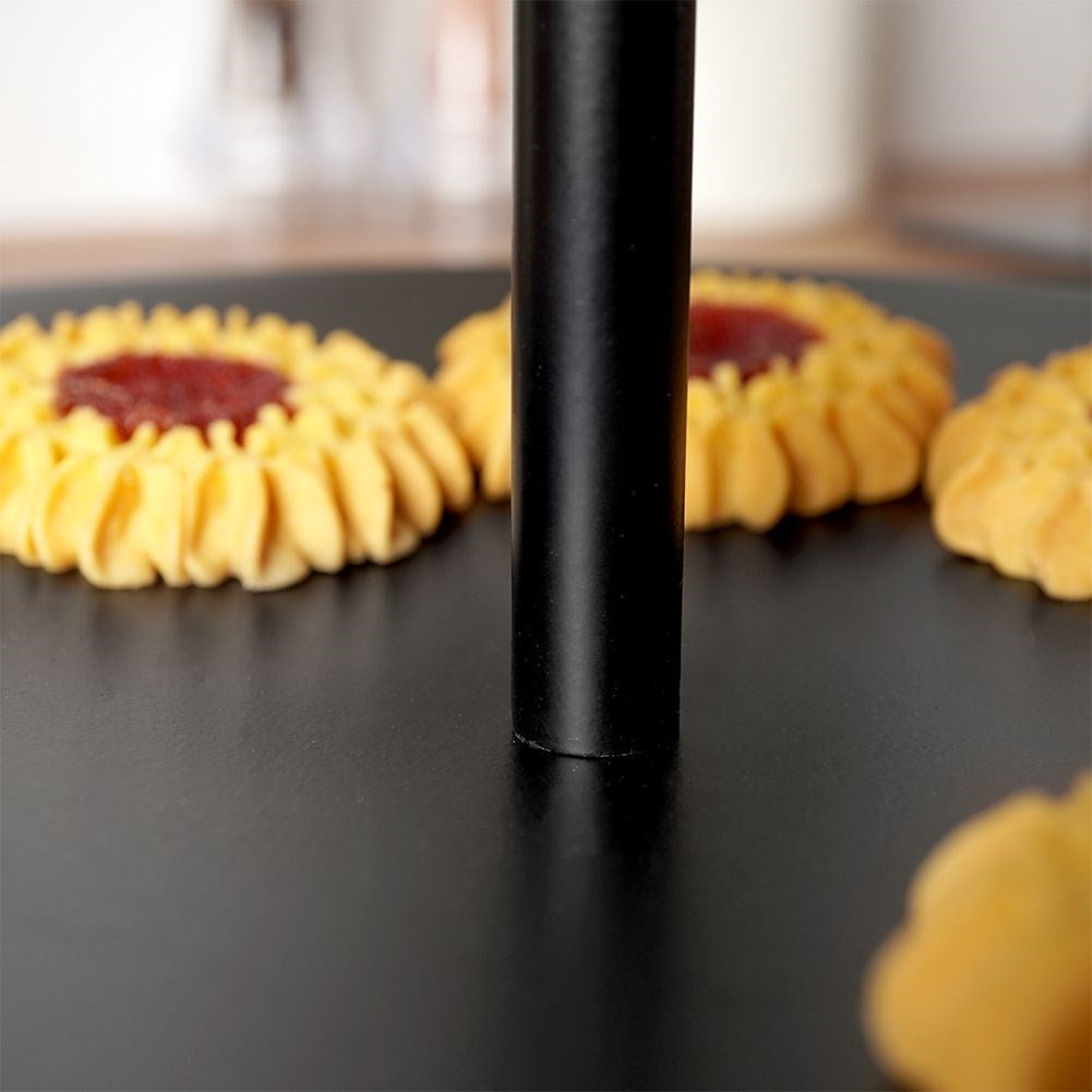 Black cake plate with three levels for muffins and desserts