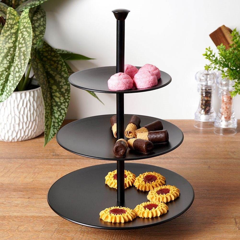 Black cake plate with three levels for muffins and desserts