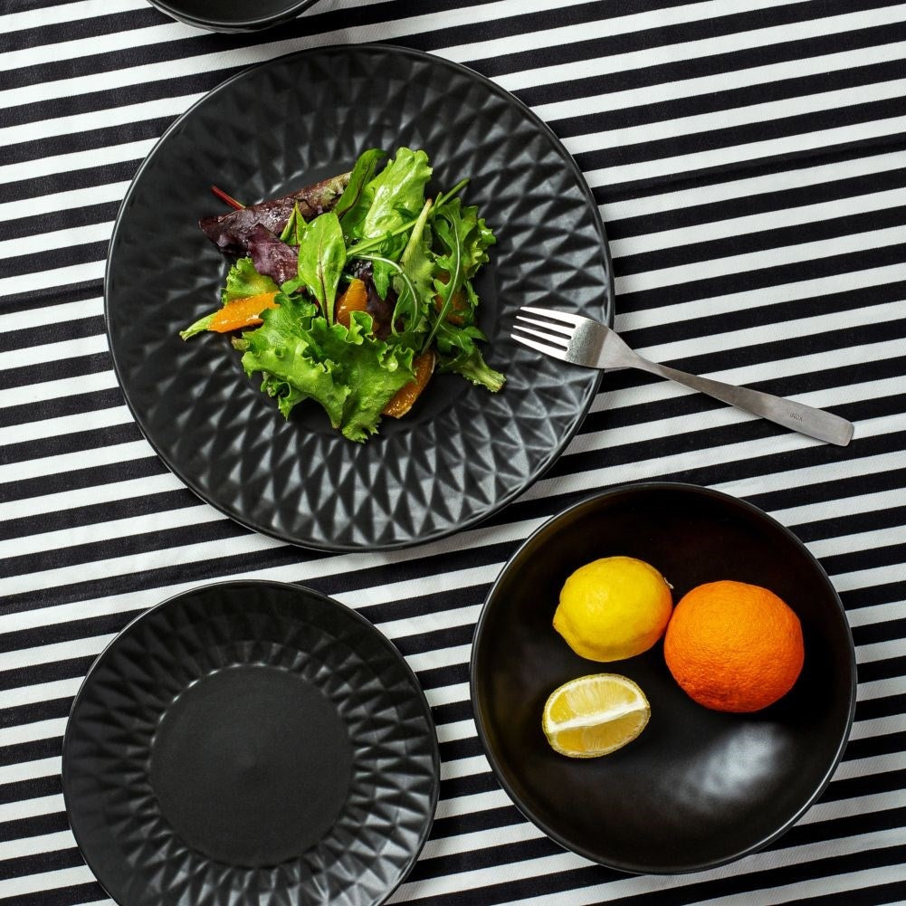 Black ceramic plate with elegant relief pattern, dishwasher safe