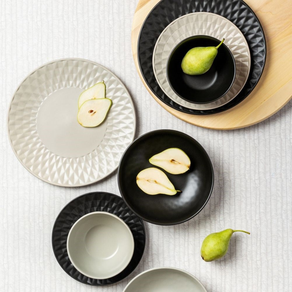 Black ceramic plate with elegant relief pattern, dishwasher safe