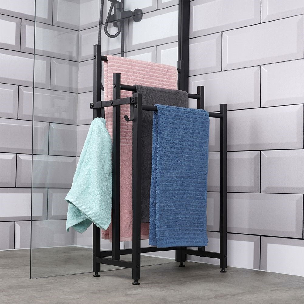 Black, free-standing towel rail with 3 bars and 2 hooks