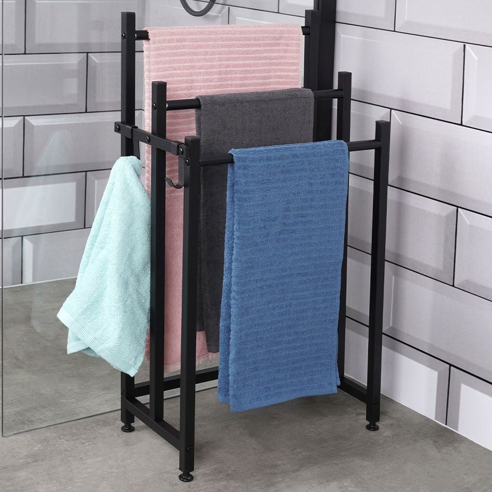 Black, free-standing towel rail with 3 bars and 2 hooks