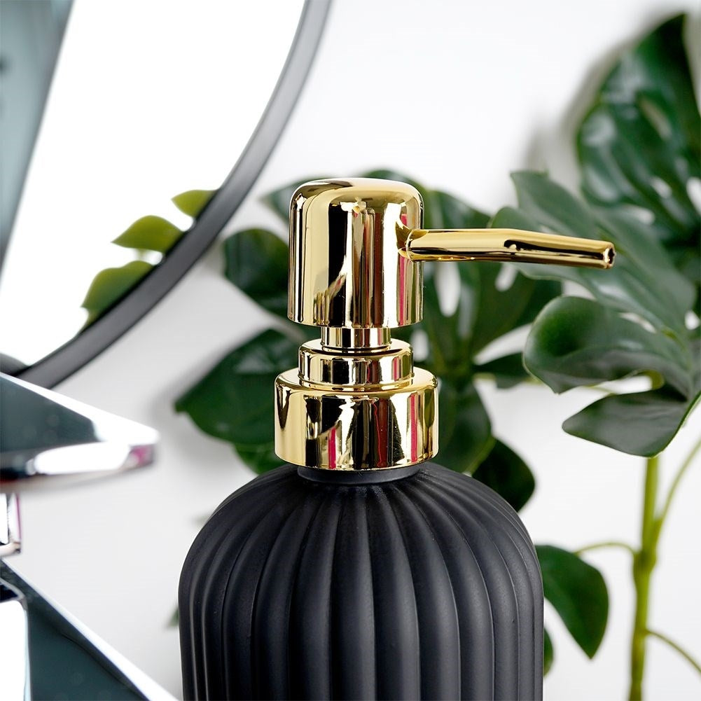 Black glass bath set: soap container, soap dish and toothbrush cup