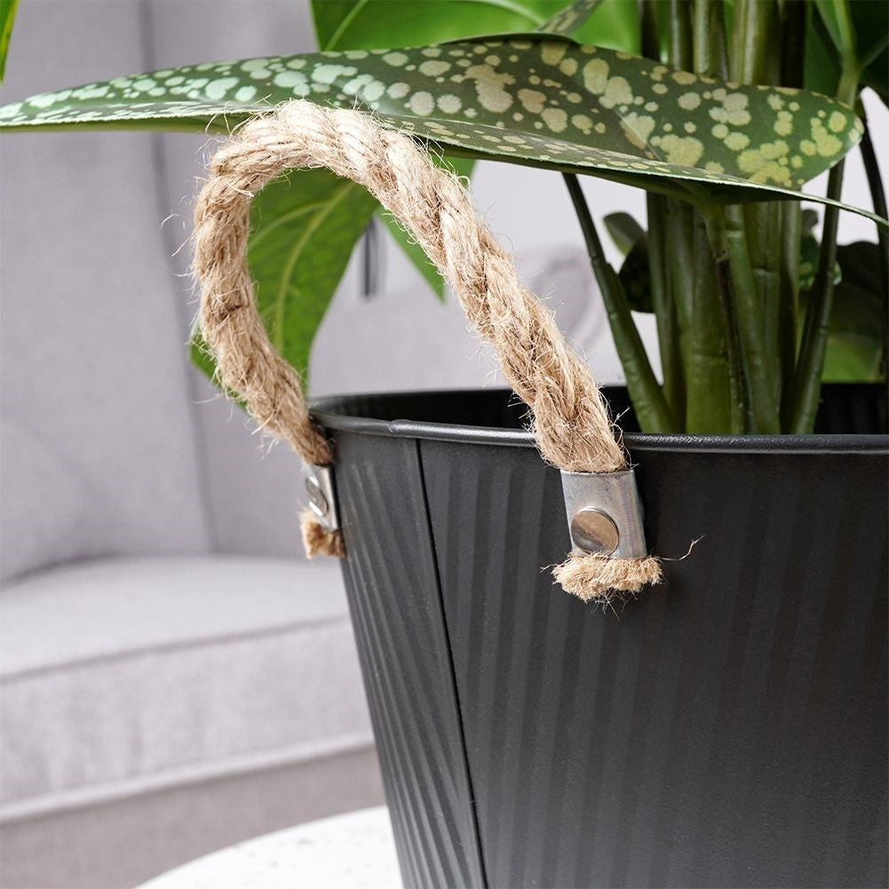 Black grooved metal pot for indoor/outdoor use