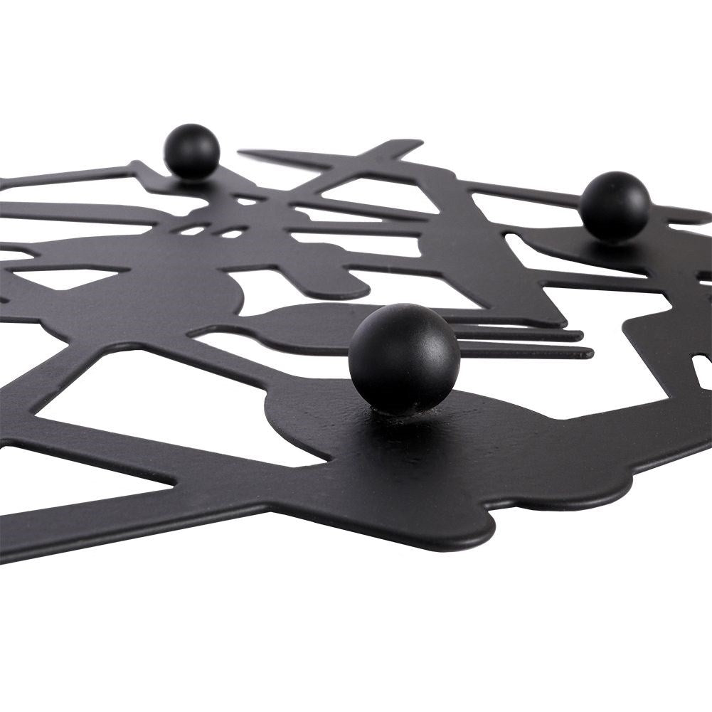 Black metal coaster for hot dishes with a stylish design