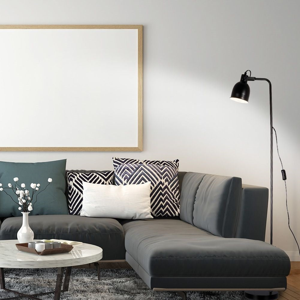 Black metal floor lamp with adjustable white lampshade