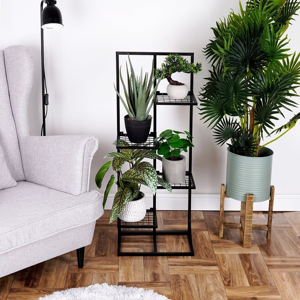 Black metal flower stand - stylish and industrial interior