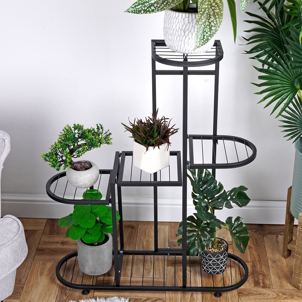 Black metal flower stand with five levels for potted plants