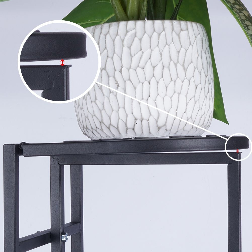 Black metal flower stand with five levels for potted plants