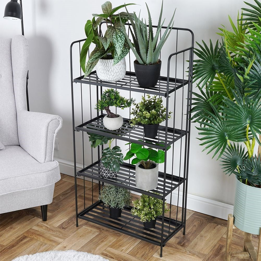 Black metal flower stand with four levels for decorations