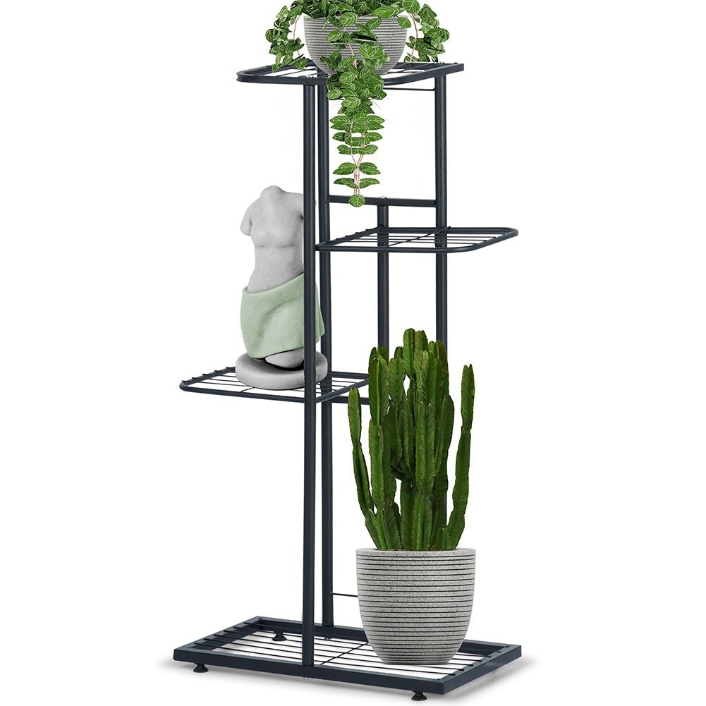 Black metal flower stand with four levels for indoor use