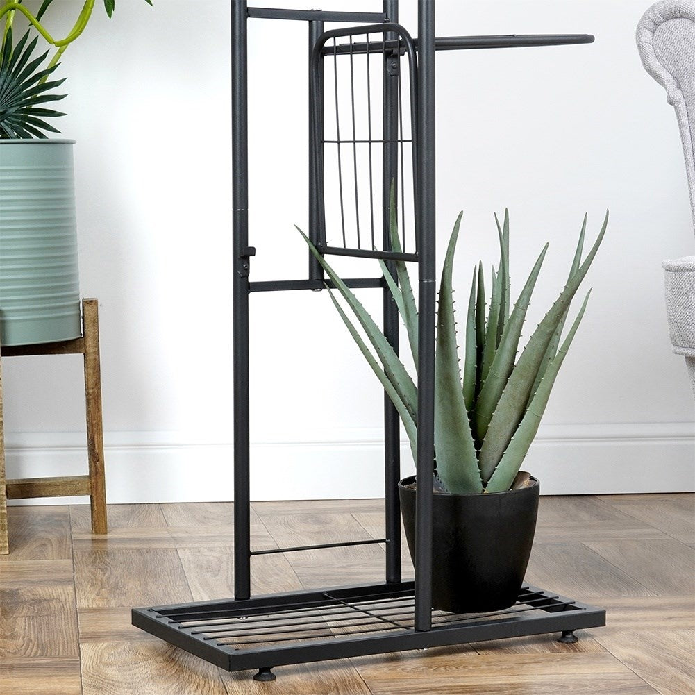 Black metal flower stand with four levels for indoor use