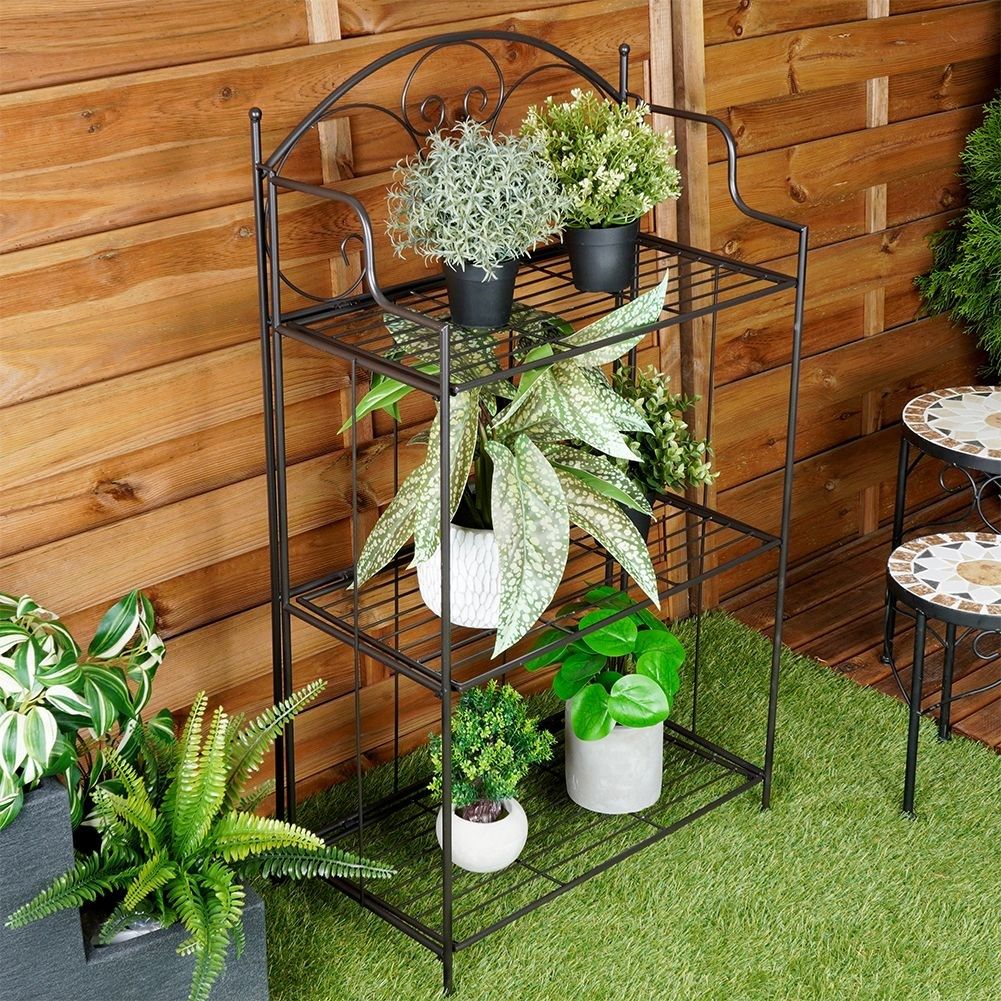 Black metal flower stand with three levels for pots