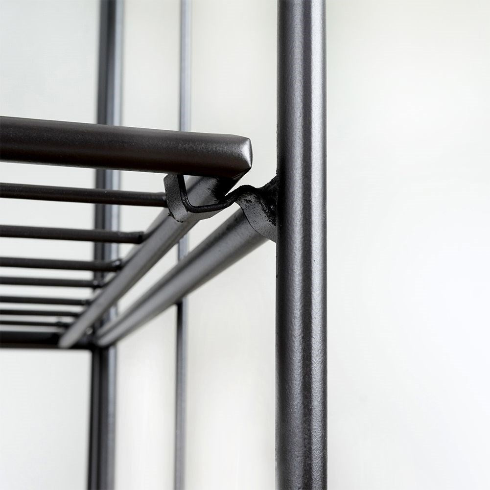 Black metal flower stand with three levels for pots