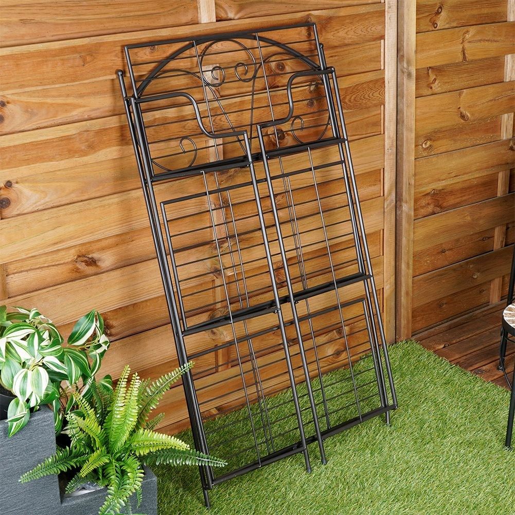 Black metal flower stand with three levels for pots