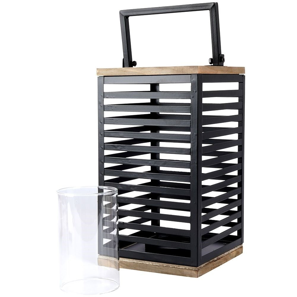 Black metal lantern with large glass insert for outside and inside
