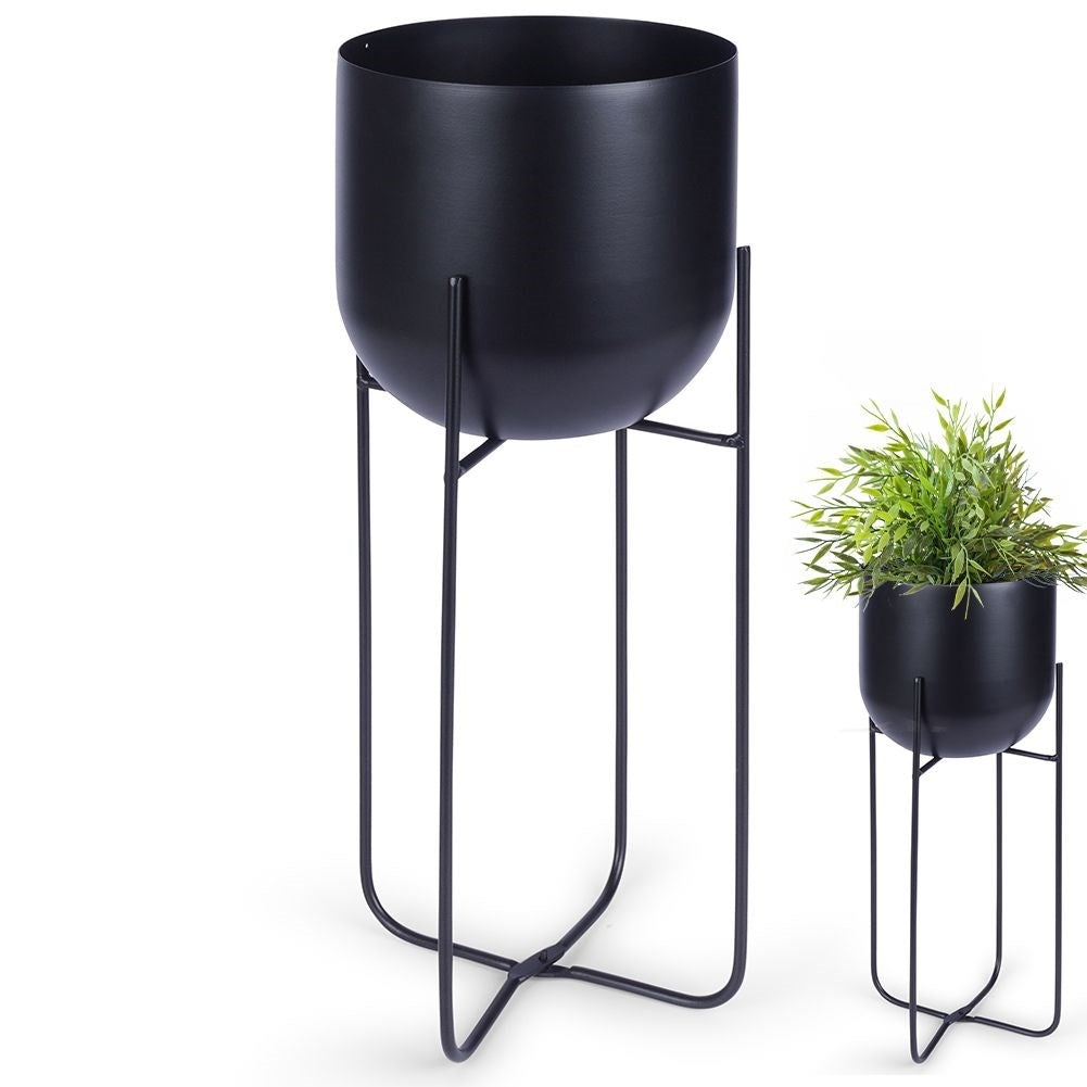 Black metal pot on stand for modern decor