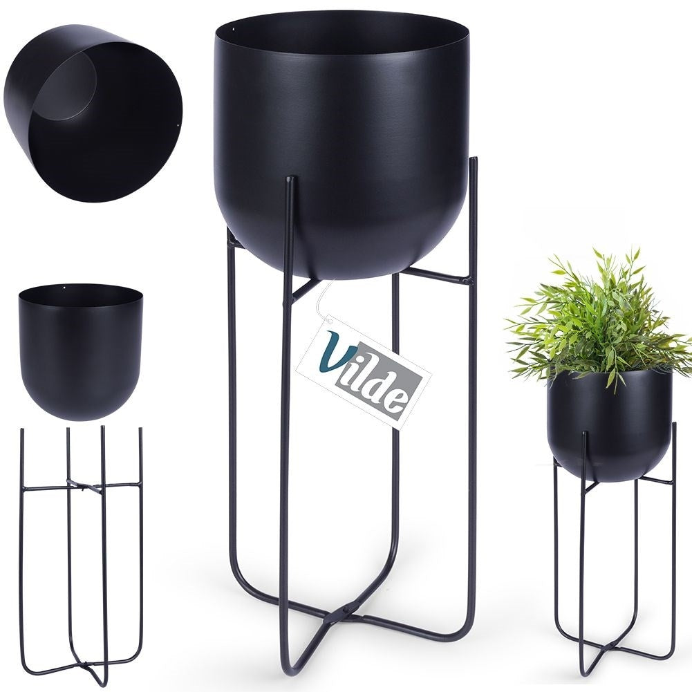 Black metal pot on stand for modern decor