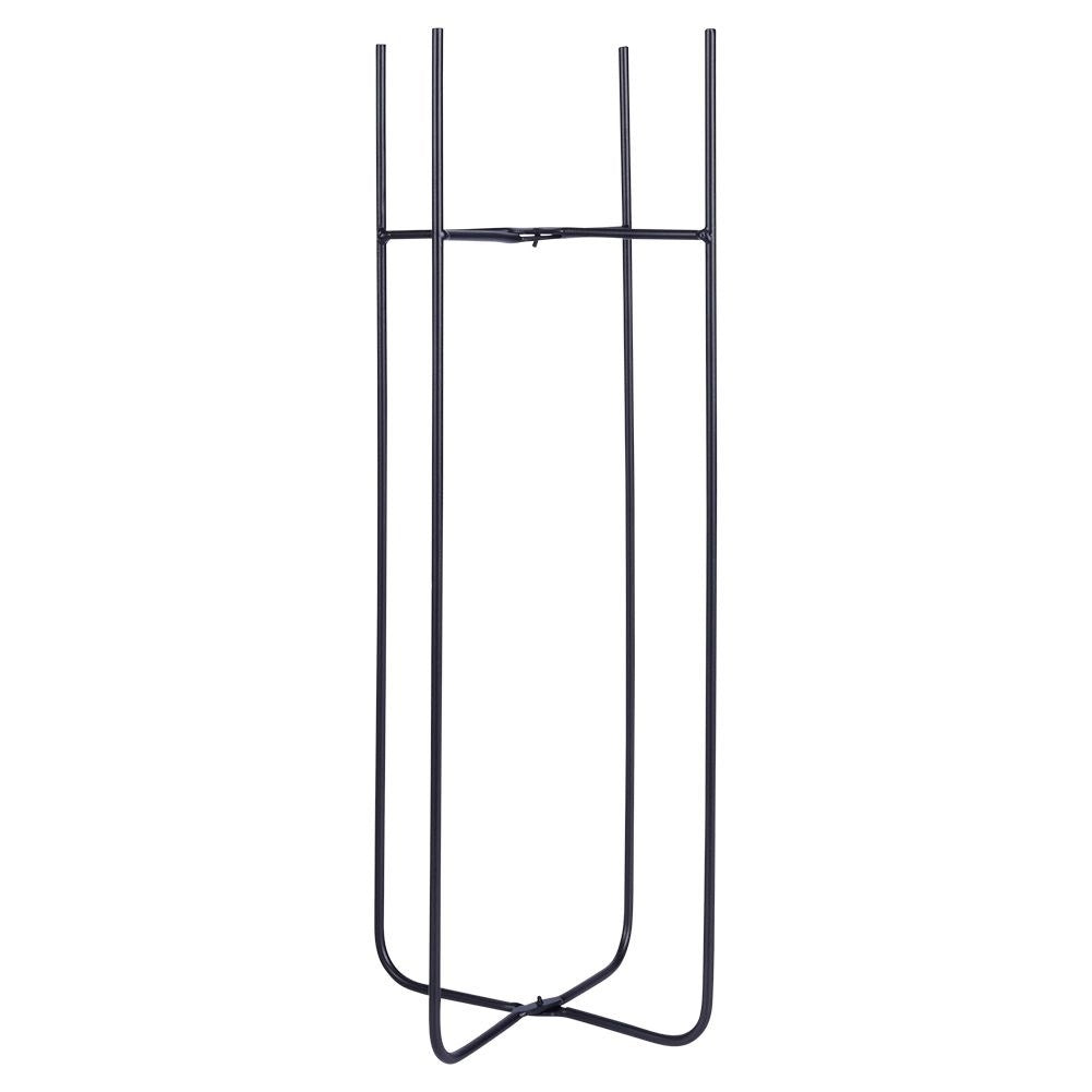 Black metal pot on stand for modern interiors