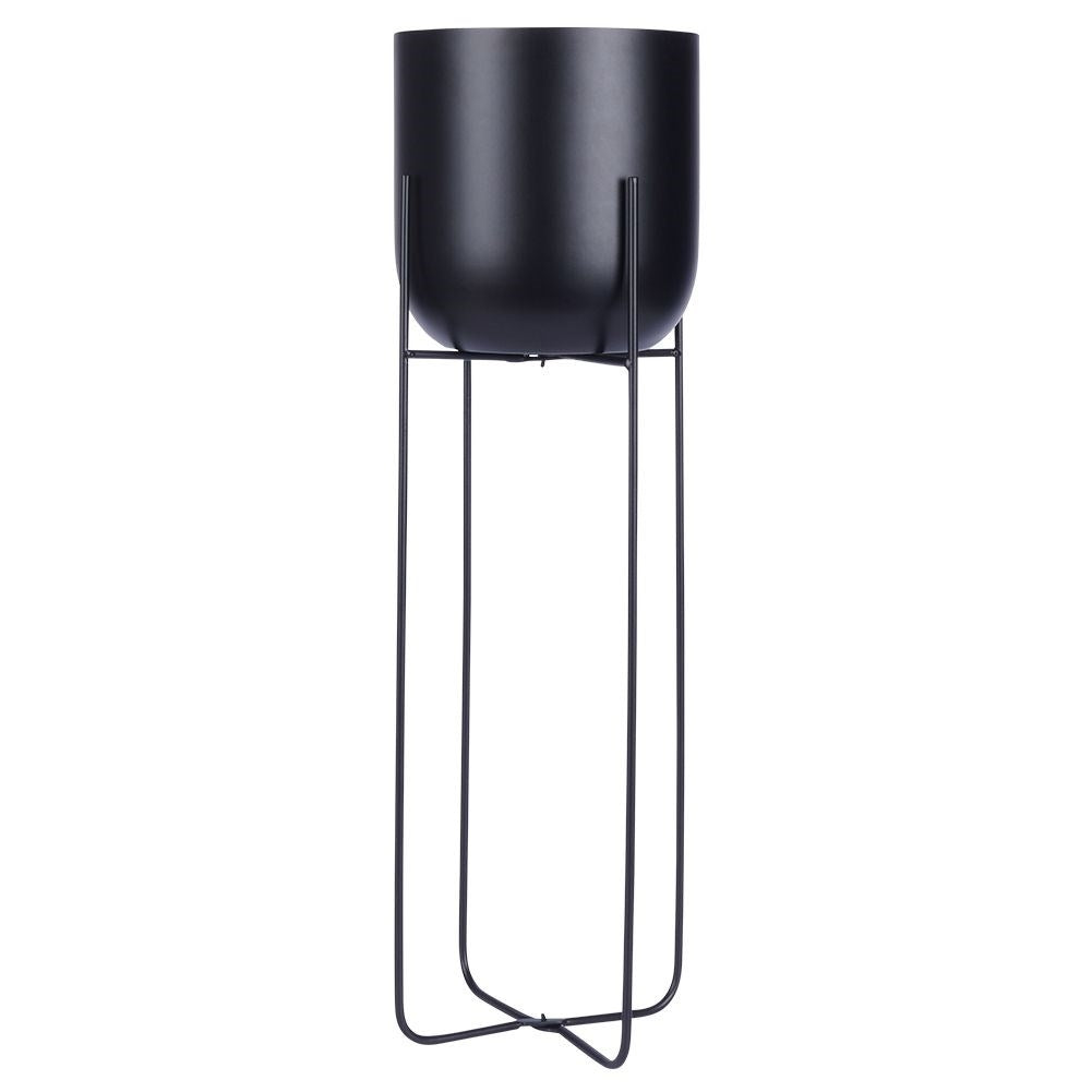 Black metal pot on stand for modern interiors